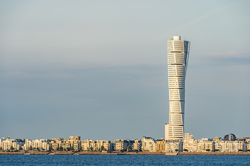 Malmo, Sweden - August 24, 2021: Turning Torso skyscraper is the tallest building in Scandinavia with 190 metres and the most recognizable landmark for Malmo.