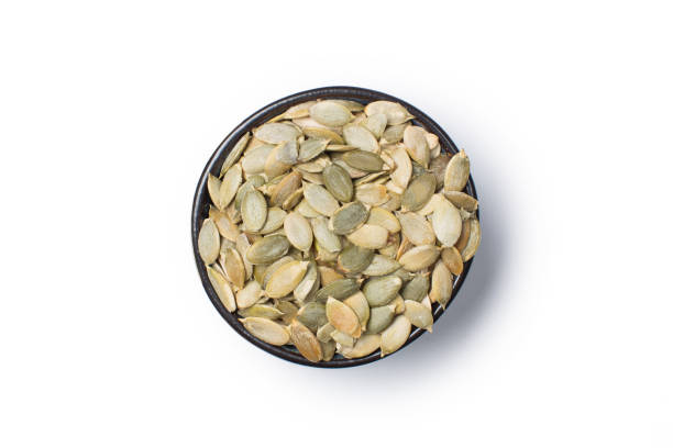 istock Pumpkin seed and pilled pumpkin seed 1342062206