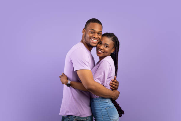 istock Happy bearded man hugging his woman at studio 1342062425