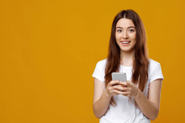 istock Pretty caucasian lady using brand new smartphone, copy space 1342062888