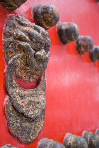 Palace Museum in Beijing, China 。Palace door handle Lion-shaped