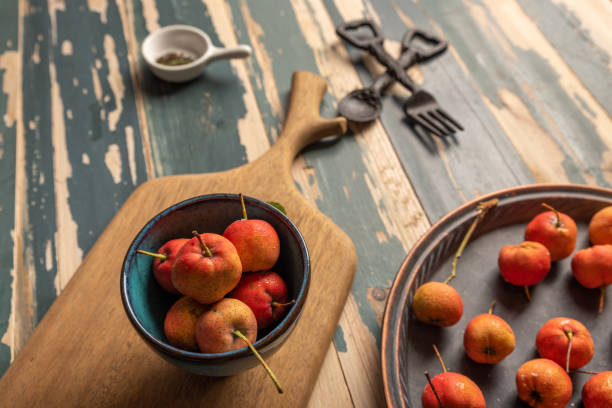 istock The red Hawthorn is placed on the wooden table 1342066057