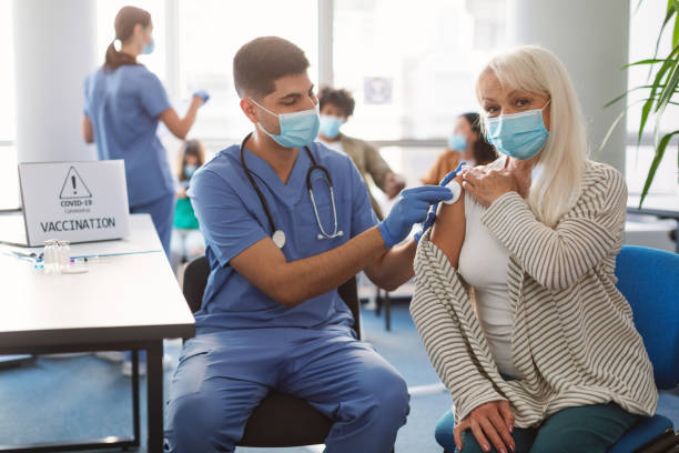 istock Senior Lady Preparing To Get Vaccinated Against Covid-19 1342070195