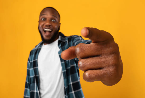 istock Excited African Man Pointing At Camera, Yellow Background 1342071869
