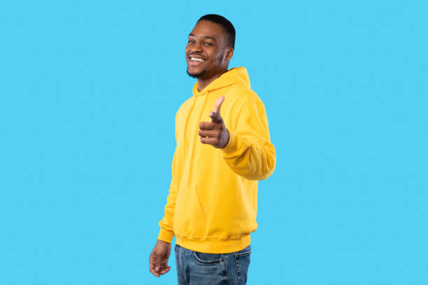 istock African Man Pointing Finger To Camera Choosing You, Blue Background 1342072320