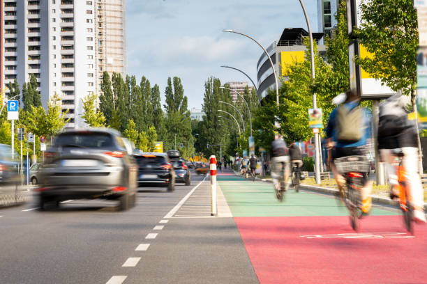 Bicycle lane on a city road shares the road with cars.