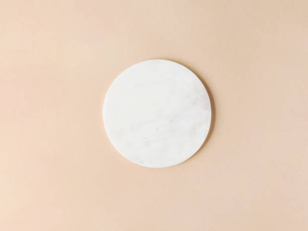 istock Marble white podium on beige background. 1342077489