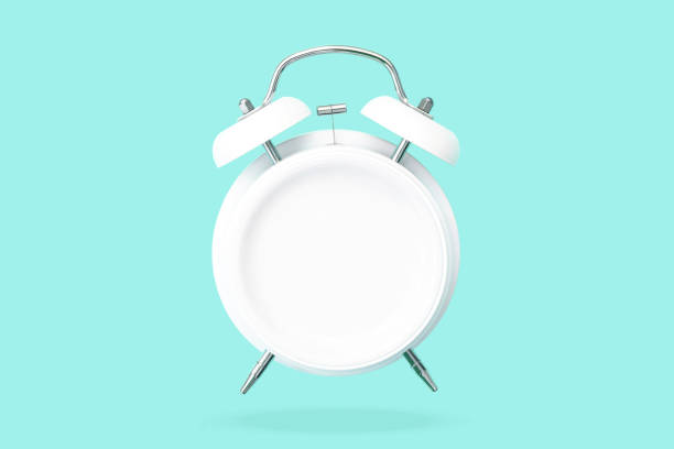 Top view Creative layout of bell Alarm clock with blank plate hovering over green pastel background. minimal idea business Concept of intermittent fasting, lunchtime, diet and weight loss. stock photo