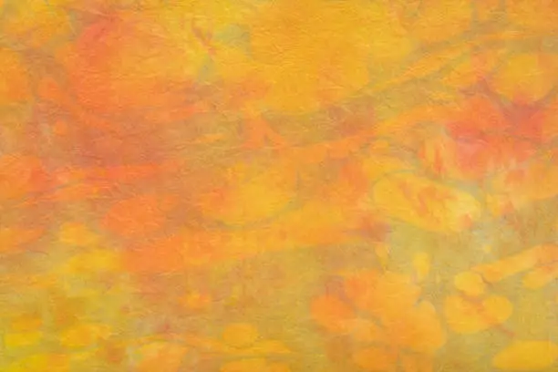 background of orange and red marbled momi paper (bottom side)