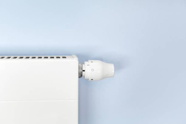 istock White radiator with a thermostat 1342080700