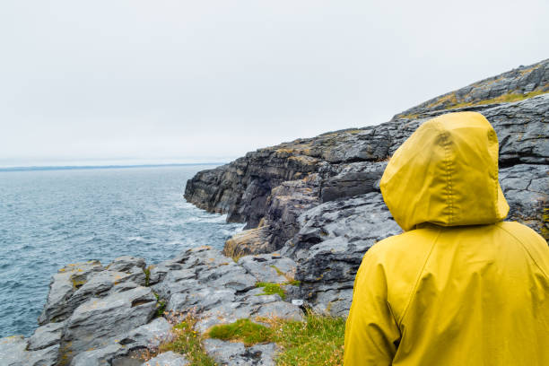 istock Person with Raincoat on Burren Ireland 1342082192
