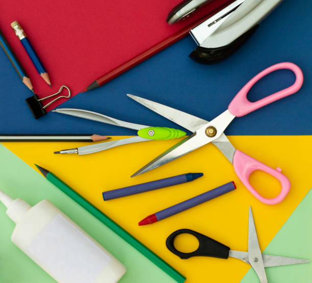 istock Office or school supplies on a colorful background. Top view. 1342083909