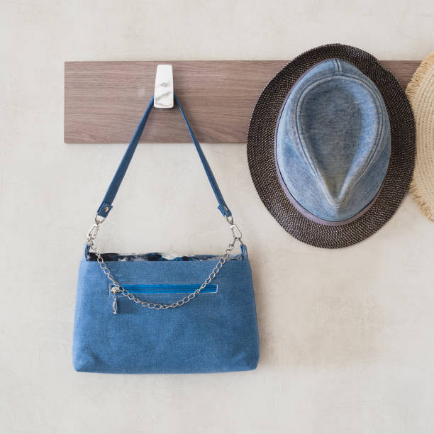 istock Denim hat and denim women bag on the hook 1342083942