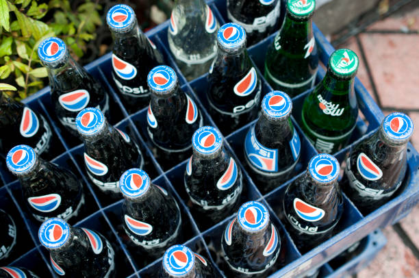 Cola Bottle with no label isolated on a white background.
