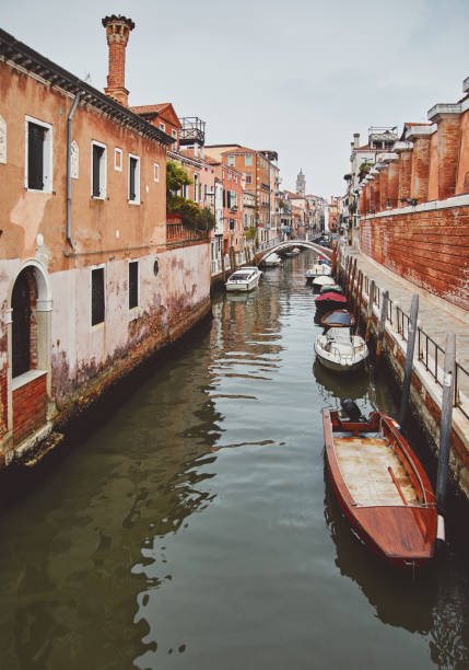 istock Channel in Venice with bridge boat gondola 1342084134
