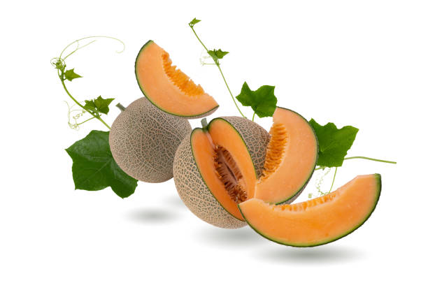 istock Orange melon or cantaloupe melon with seeds isolated on green background 1342086180