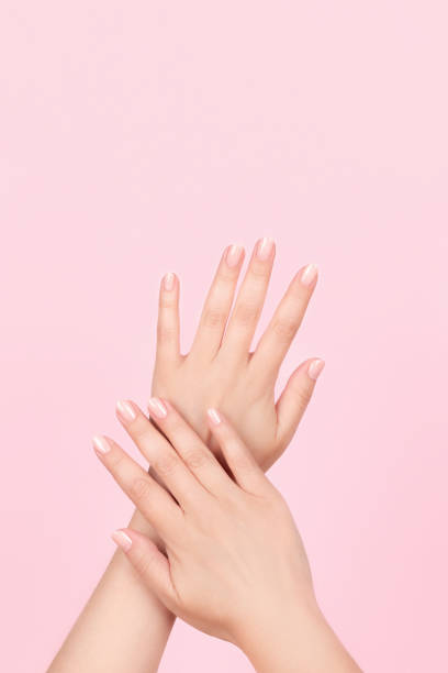 istock Female hands with nude nails 1342086742
