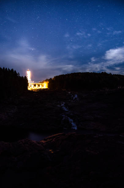 istock Shawinigan illuminated dam during summer night with stars 1342088295