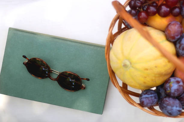 istock Picnic Basket, Book and Sunglasses 1342088623