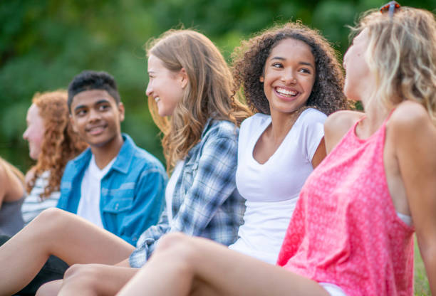 istock Teenagers Relaxing Outside 1342089022