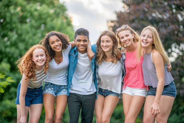 istock Teenagers Laughing Together Outside 1342089034
