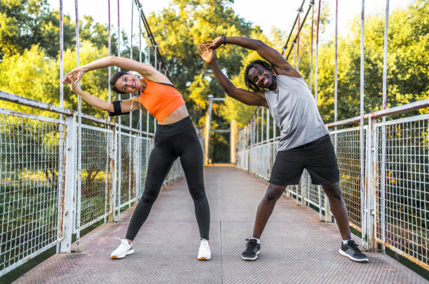 istock Sporty couple stretching outdoor 1342089132