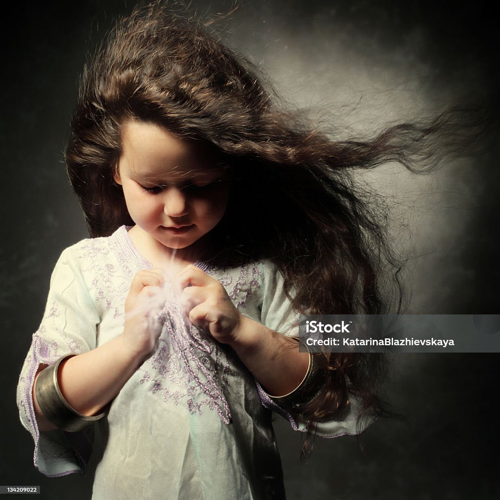 Little Angel Little girl with long flying hair. Baby - Human Age Stock Photo