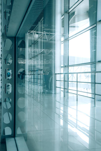 istock Interior of a modern airport terminal building 1342090735