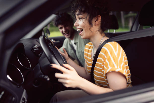 istock Excited young couple traveling by car 1342093157