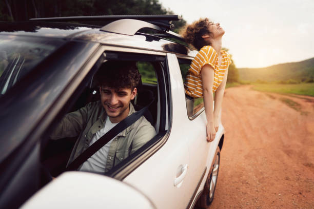 istock Smiling couple enjoying on a road trip 1342093182