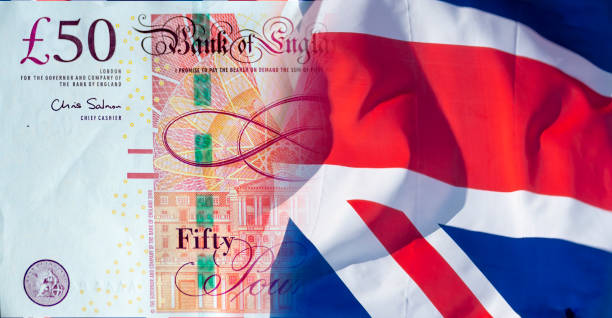 istock UK flag and new fifty pound note 1342093364