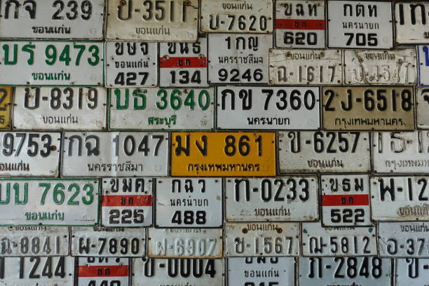 istock Old car and motorcycle license plates that stop using on the wall 1342093517