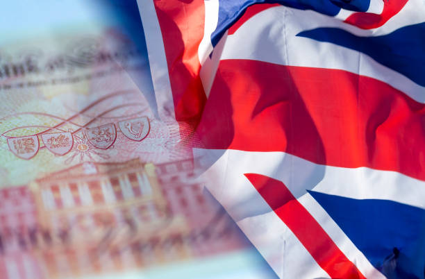istock UK flag and new fifty pound note 1342093768