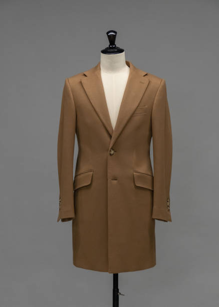 istock Beige coat on a mannequin in the studio 1342096125