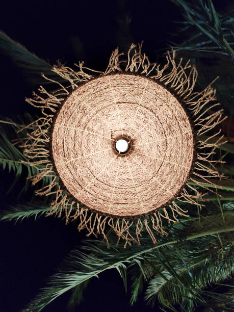 istock Lamp bulb in rattan lampshade 1342096797