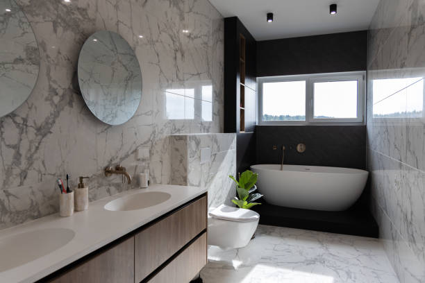 istock Modern bright bathroom with green plant and window 1342100837