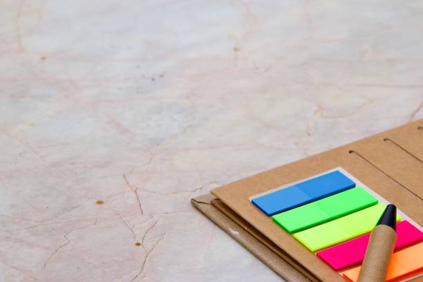 istock classic notebook and ball pen on empty copy space of marble table for text quote caption or background for your work under concept“start a  business from scratch” usage 1342101560