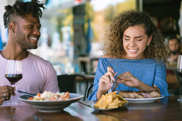 istock Couple having lunch together at a restaurant. 1342101690