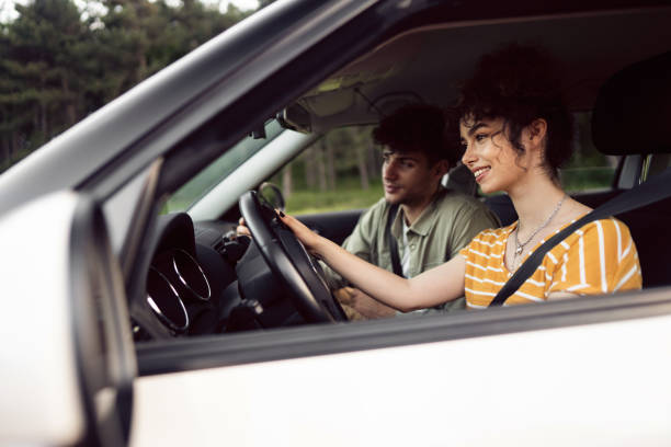 istock Smiling young Caucasian couple having fun during their summer road trip 1342102744
