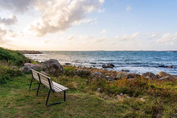 Seashore with a bench in Varberg on the Swedish west coast.