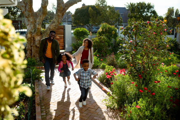 istock Happy african american family returning back home 1342104129
