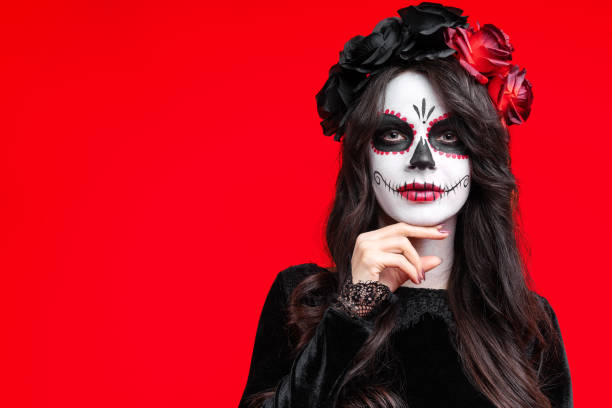 istock Sugar skull makeup on happy Halloween party 1342104777