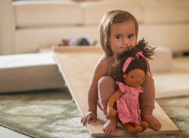istock Toddler and Her Toy Doll 1342105515