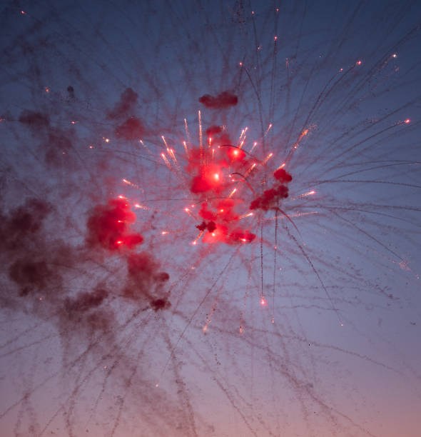Holiday background  with  colorful firework in the night sky