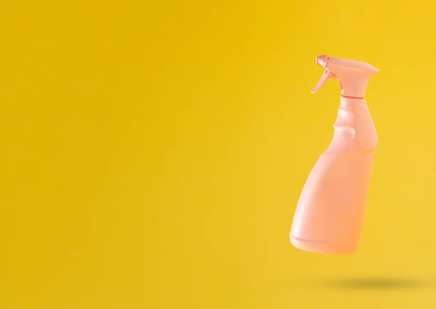 istock Creative marketing idea. Pink window cleaner against yellow background with copy space. Advertisement idea. Minimal banner ad concept. Abstract 3D Background Art. 1342108263