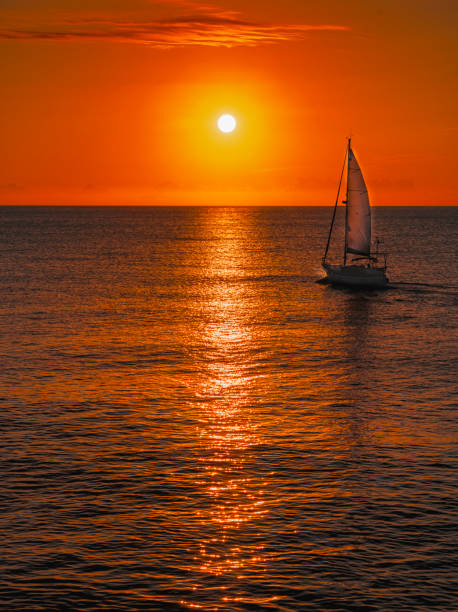istock Sailing into the sunrise, Javea Bay. 1342108299