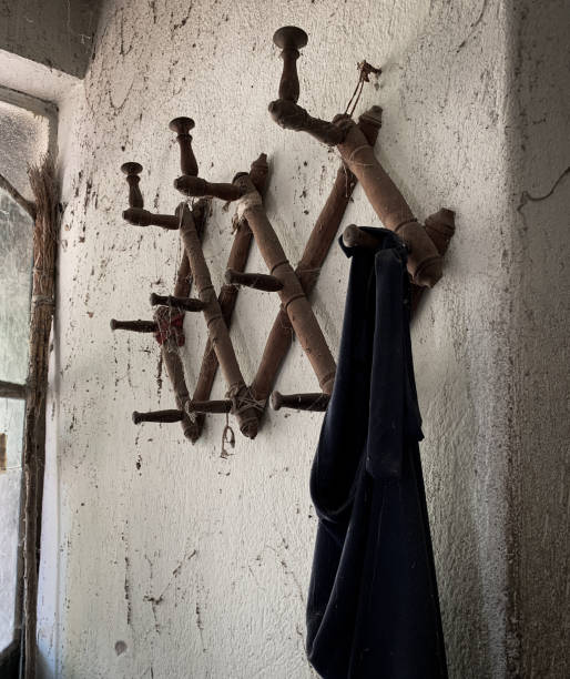 istock Vintage wall hanger inside abandoned house. 1342108671