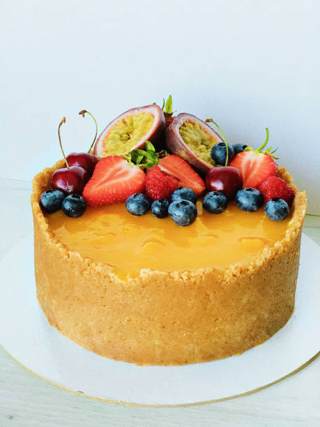 Classic cheese cake New York with mango jelly and fruits