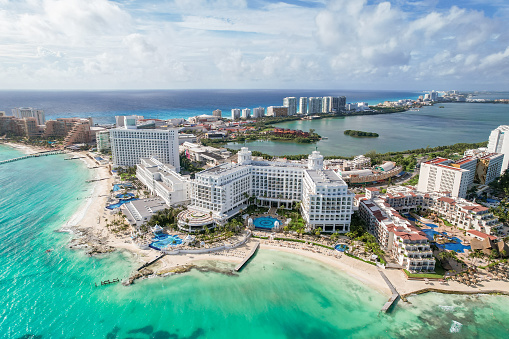Cancun, Mexico - September 17, 2021: View of beautiful Hotel Riu Palace Las Americas in the hotel zone of Cancun. Riviera Maya region in Quintana roo on Yucatan Peninsula. Aerial panoramic view of allinclusive resort