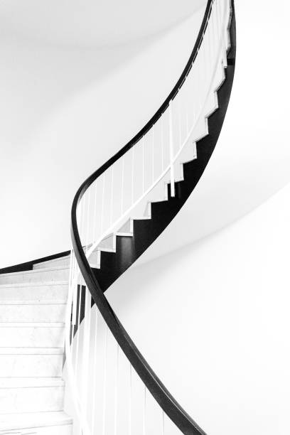 istock Spiral staircase details with beautiful curve and subtle shadow 1342112277